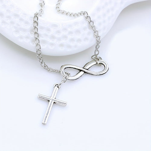 Collar con dije de cruz eterna | Oro blanco