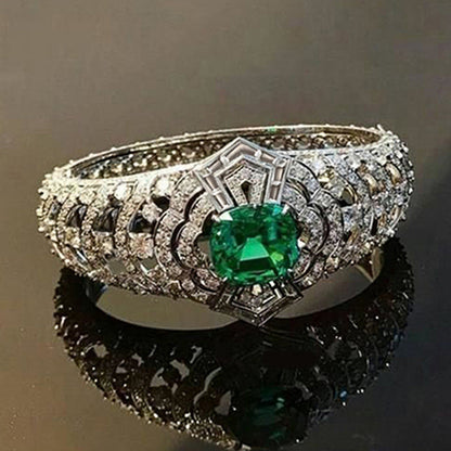 Anillo art déco con esmeralda | Oro blanco