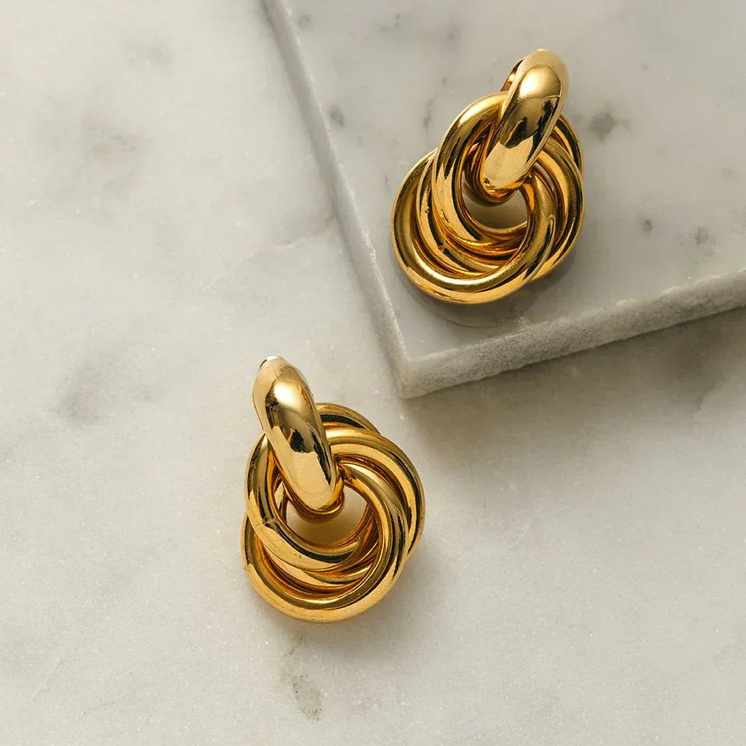 Aretes entrelazados llamativos | Oro