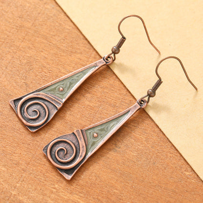 Aretes de cobre con espiral tribal