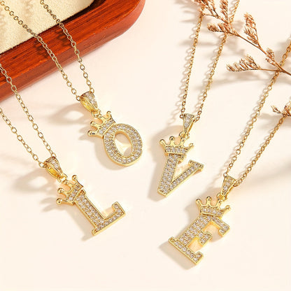 Collar con inicial y corona | Oro
