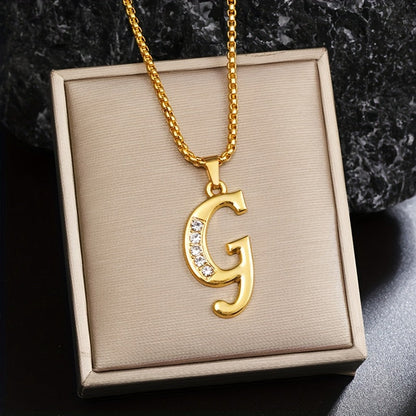 Collar con inicial y detalle de cristal | Oro