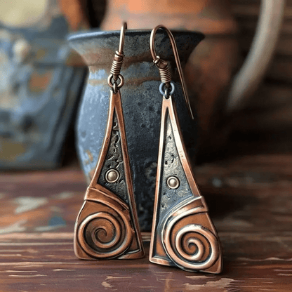 Aretes de cobre con espiral tribal