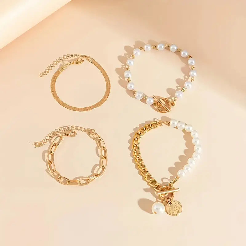 Elegante conjunto de 4 pulseras doradas: serpiente, perlas y eslabones | Oro